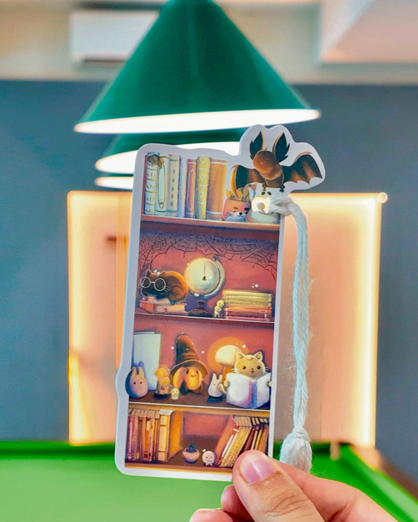 Handmade Halloween Bookmark: Black Cat on Bookshelf with Lamps, Plants, Spider Web, Bat